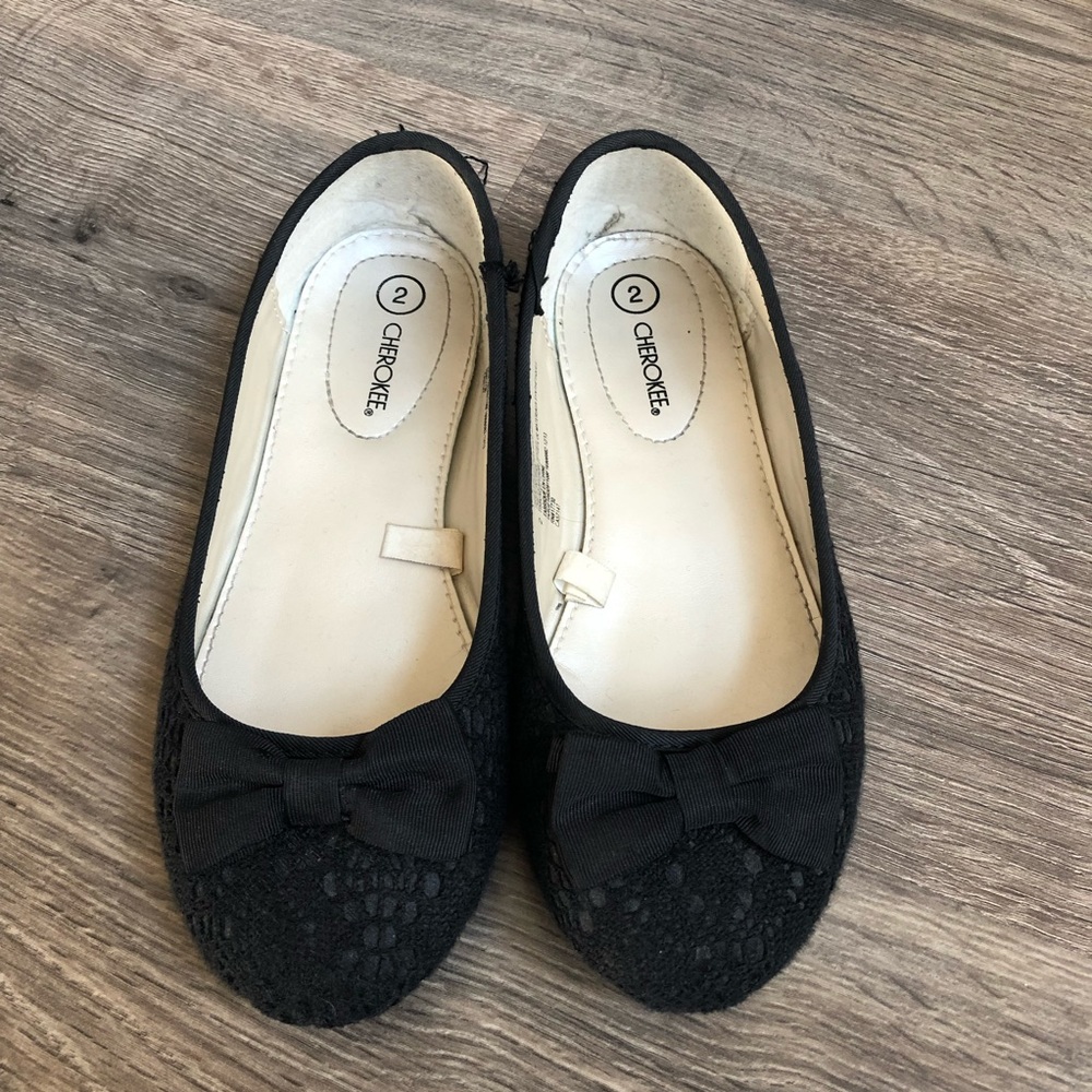 Black flats.
